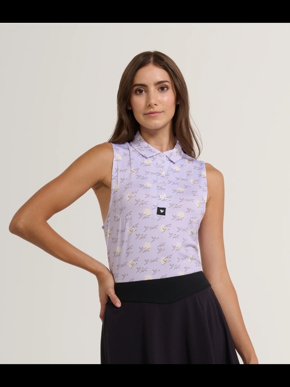 Bad Birdie Lavender Sleeveless Golf Polo with White Floral Print